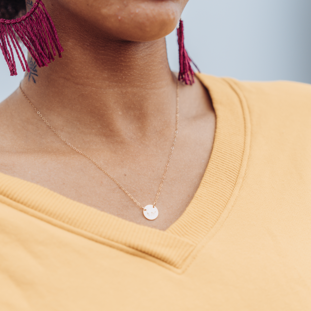 Minimalist, gold-filled necklace stamped with a vine