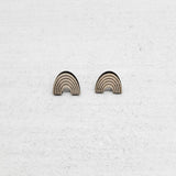 Rainbow earring made out of wood. Purchases support women who have aged out of foster care.
