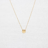 Minimalist, gold-filled necklace stamped with a vine